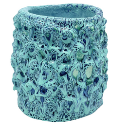 Front view from another side of the Ceramic Vase in Aqua and Saltwater Blue, highlighting the unique hand-formed waves and intricate texture of the Onda Series.