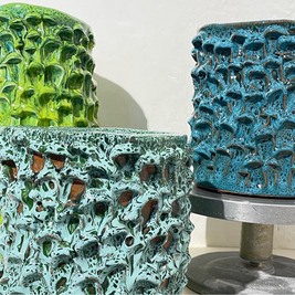 Showcase of three Ceramic Vases in Biscay Bay, Marine Blue, and complementary colors from the Onda Series, displayed together to highlight the texture and color harmony.
