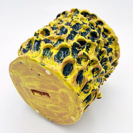 Bottom view of the Ceramic Vase in Cadmium Yellow and Izmir Blue, showcasing its handcrafted base and the distinct texture of the Onda Series.