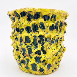 Front view of the Ceramic Vase in Cadmium Yellow and Izmir Blue, showcasing the organic wave texture and vibrant colors against a white background.