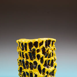 Front view of the Ceramic Vase in Cadmium Yellow and Izmir Blue with a soft gradient background, highlighting its smooth texture and bold colors in contrast to the surface.