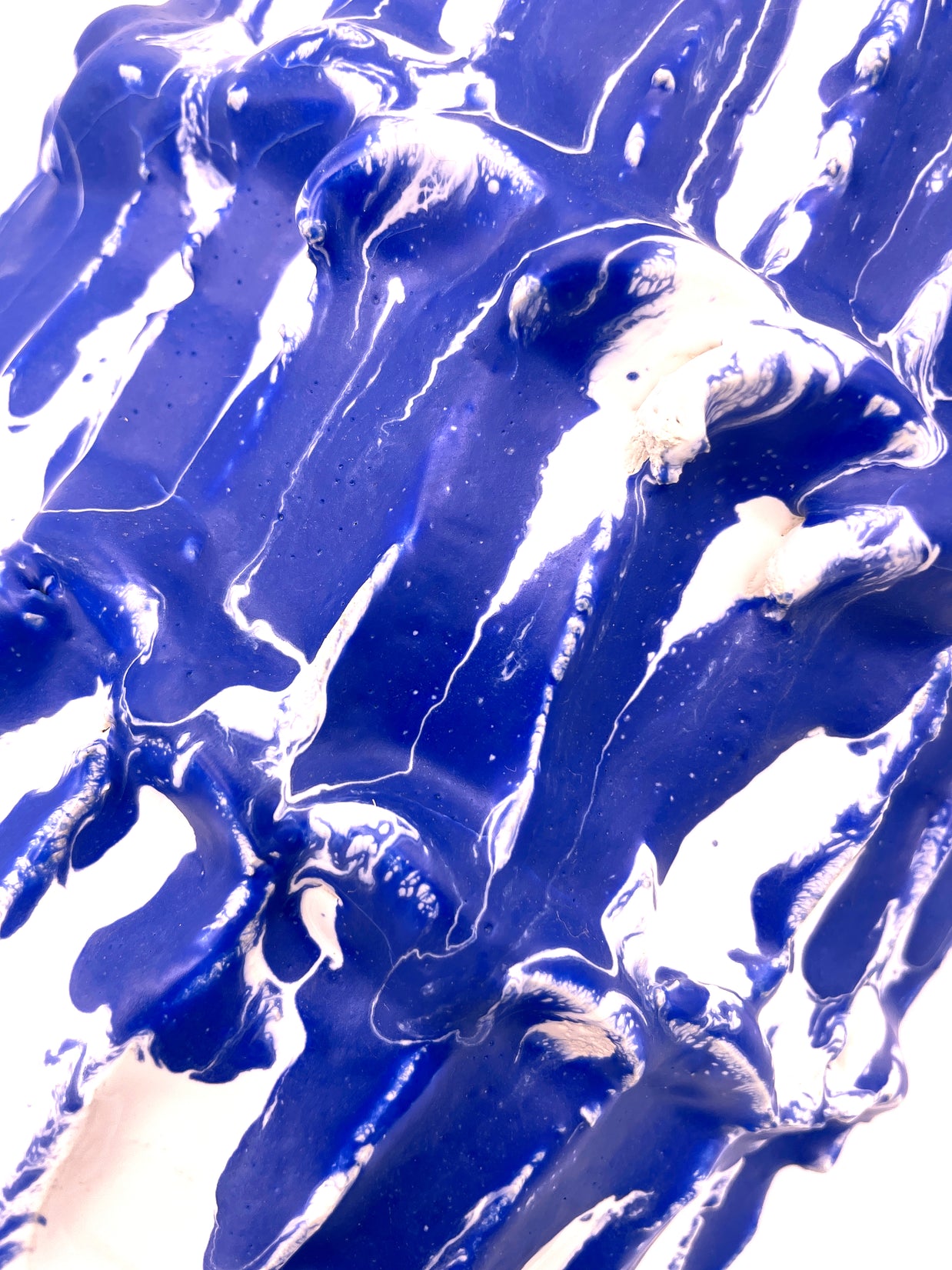 Side detail of the Ceramic Vase in Egyptian Blue and White, highlighting the delicate gradient of colors and hand-applied textures.