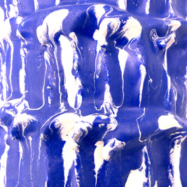 Close-up side detail of the Ceramic Vase in Egyptian Blue and White, focusing on the interplay of bold blue and soft white tones.