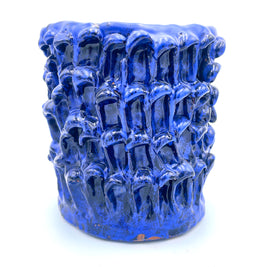 Front view of the Ceramic Vase in Egyptian and Izmir Blue, displayed on a white background, highlighting its elegant silhouette and deep blue hues.