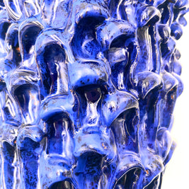 Detail view of the Ceramic Vase in Egyptian and Izmir Blue, highlighting the interplay of texture and color in the midsection of the vase.