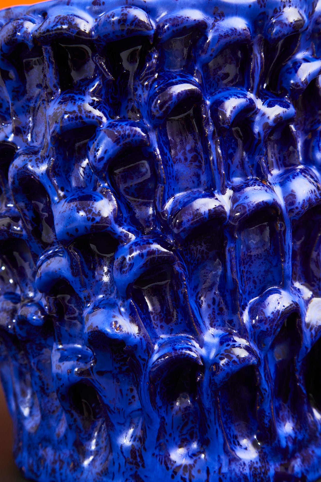 Wider and darker detail view of the Ceramic Vase in Egyptian and Izmir Blue, emphasizing the depth of texture and shadow play on the glaze.