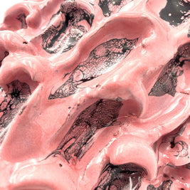 Detailed perspective of the Ceramic Vase in Haime Pink and Liquorice, focusing on the subtle textures and rich glaze application, with a net texture of the liquorice tonesover the pink ones.