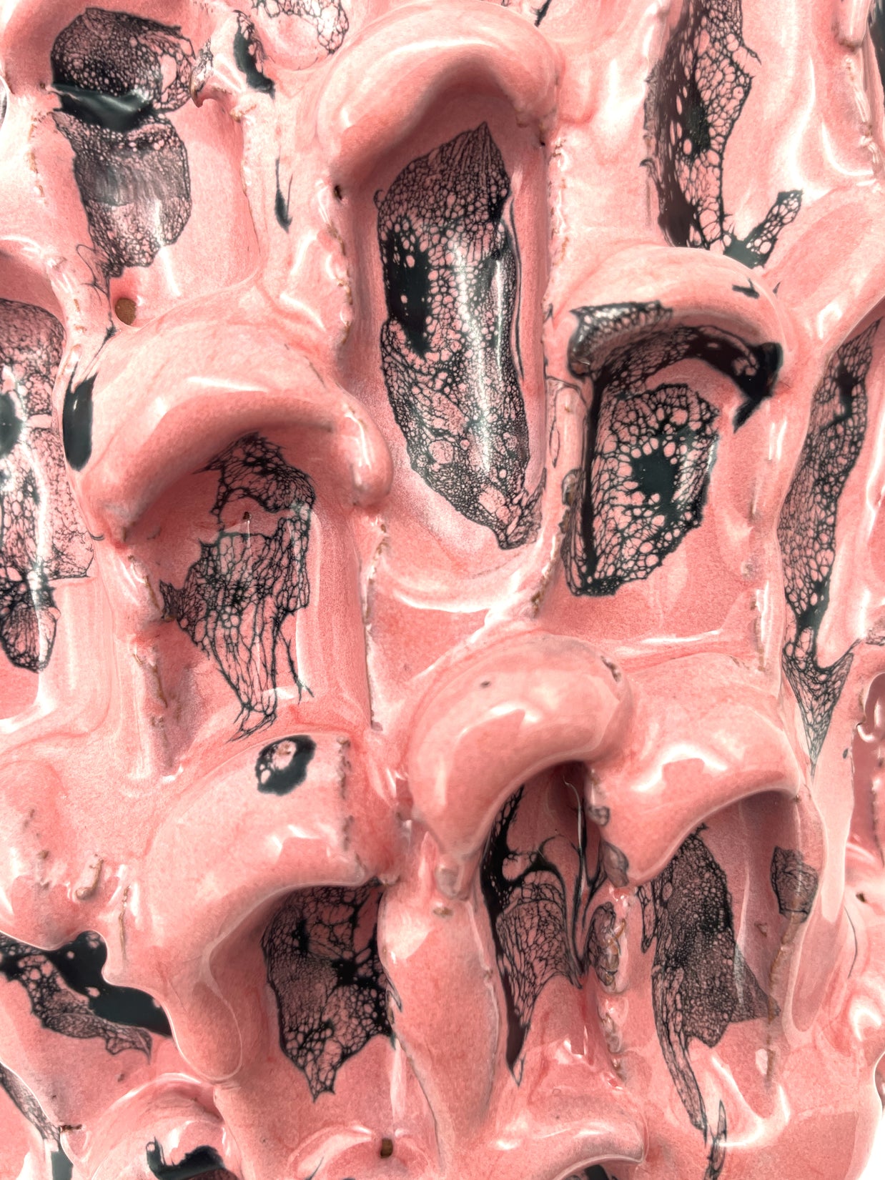 Zoomed-in detail of the Ceramic Vase in Haime Pink and Liquorice, showcasing the intricate glaze texture and tonal contrasts, with a net coloured texture.