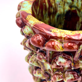 Upper side view of the Ceramic Vase in Honey and Turquoise, highlighting the smooth gradient of honey brown to turquoise blue glaze.