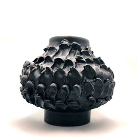 Front view of the Ceramic Vase in Licorice Black, with its sleek cylindrical base, widening center, and narrowing top, set against a clean white background.