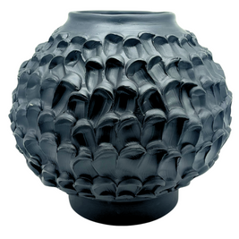 Front view of the Ceramic Vase in Licorice Black, showcasing its rounder side with a tapered top that subtly hides the opening, set against a white background.