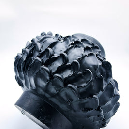 Horizontal perspective of the Ceramic Vase in Licorice Black, emphasizing its cylindrical base, wider middle, and tapered top in a smooth, sleek finish.