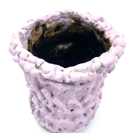 Top-down view of the Ceramic Vase in Lilac Bubble & Chocolate, highlighting the black interior and intricate bubble-like details along the rim, set on a white background.