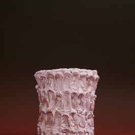 Front view of the Ceramic Vase in Lilac Bubble & Matte Mauve, styled with a black and terracotta-toned background, highlighting its soft pastel palette and artisanal details.