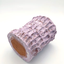 Horizontal zoomed-out view of the Ceramic Vase in Lilac Bubble & Matte Mauve, highlighting its elegant shape and subtle transitions between pink and peach tones.
