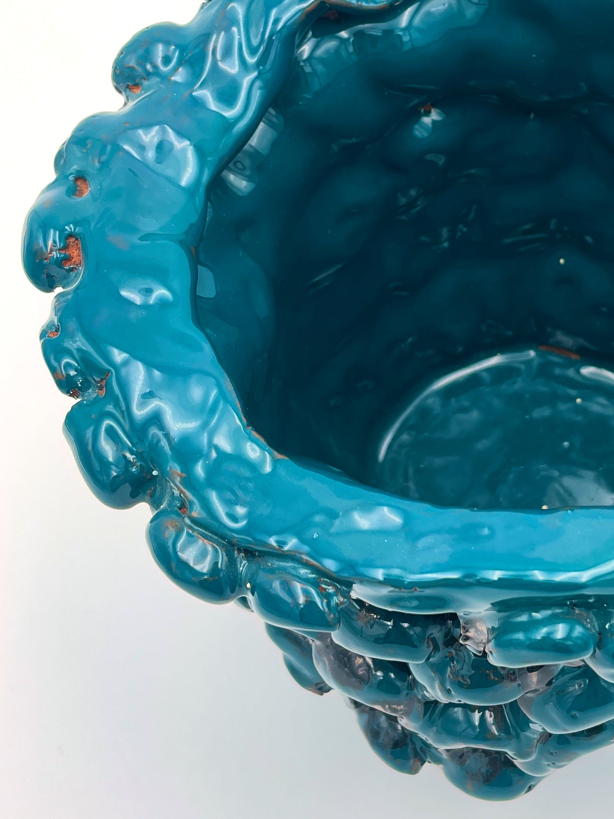 Close-up of the top rim of the Ceramic Vase in Metallic Biscay Bay, focusing on the glossy petrol blue and golden accents.