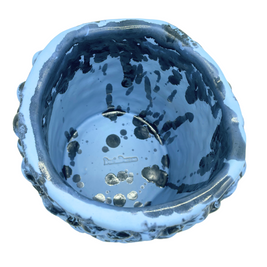 Top view of the Ceramic Vase in Whispy Matte Blue and Liquid Bronze, displaying its predominantly blue interior with silver and bronze accents around the rim.