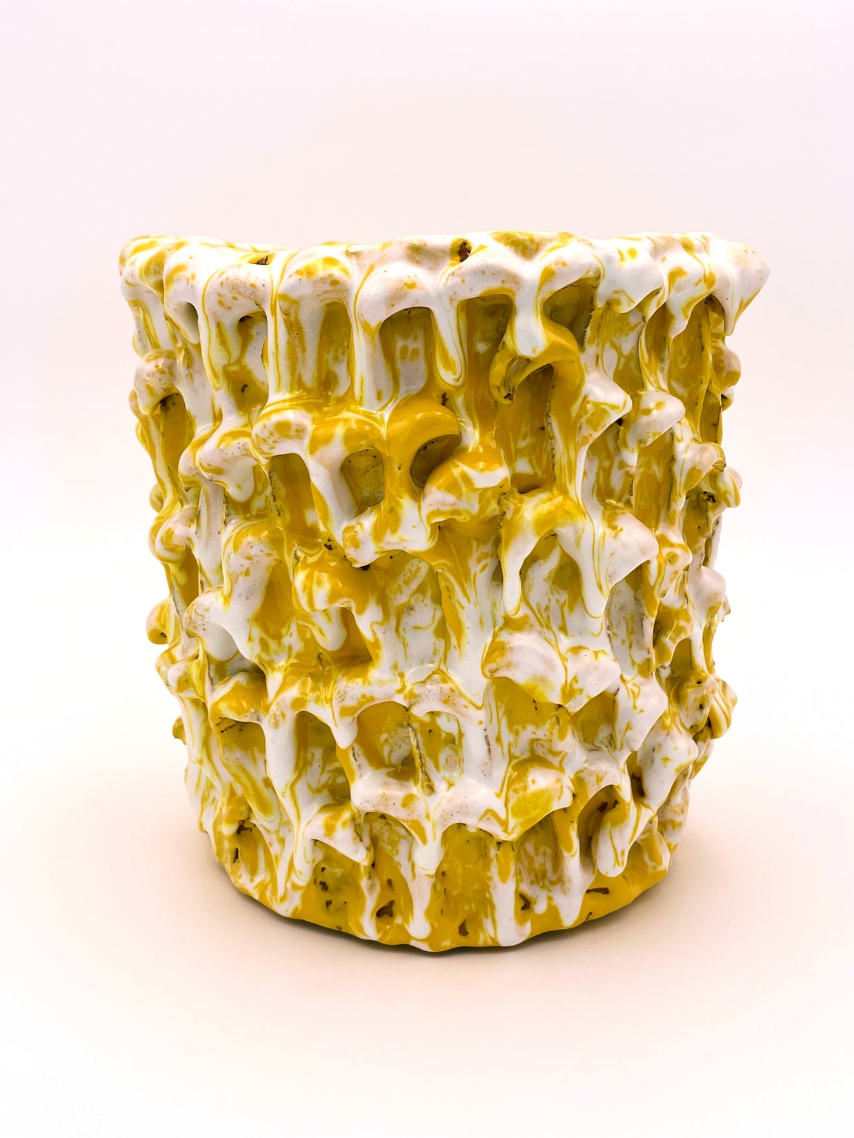 Front view of the Ceramic Vase in Metallic Mineral Blush, showcasing its unique blend of yellow and white tones on a white background.