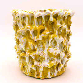 Front view of the Ceramic Vase in Metallic Mineral Blush, showcasing its unique blend of yellow and white tones on a white background.
