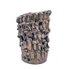 Front view of the Ceramic Vase in Metallic Platinum, highlighting its wavy metallic finish with reflective platinum tones on a white background.