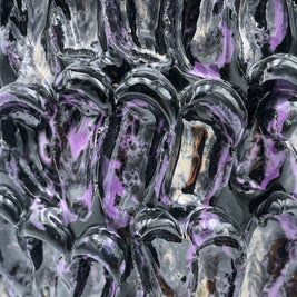 Close-up detail of the Ceramic Vase in Metallic Purple, showcasing its intricate texture with glossy purple and bronze highlights.