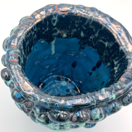 Close-up top view of the Ceramic Vase in Metallic Tiffany and Turquoise, displaying its bicolored interior with light turquoise at the base, darker tones near the rim, and hints of reddish-bronze accents.