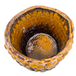 Top view of the Ceramic Vase in Translucent Honey, revealing the darker inner base contour, emphasizing the depth and craftsmanship and the author's signature on the bottom.