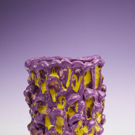 Front view of the Ceramic Vase in Velvet Purple and Lemon Yellow, placed against a gradient background transitioning from deep violet at the top to white at the bottom.